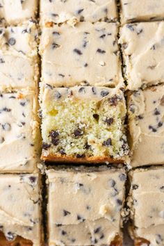 a close up of sliced cake with chocolate chip toppings on the top and bottom