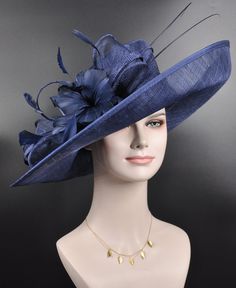 "Description: This beautiful sinamay hat is an elegant wear at any church or derby event. its sinamay material is not too intimidating and attracts the eye. The chic flower adnorment that rests on the wide, side sweep brim is complemented by sinamay accentuations. Material: Sinamay with feathers Crown Width; 8 inch Crown Height: 4 inch Brim Width: 18 inches Head girth is from 22' to 23.22 \" adjustable size fits  most with an adjustable cord strap for the smaller fit If you need to  some colors on the hat to match your dress, please let me know Color on screen may vary from actual merchandise due to monitor restrictions or dye lots." Fitted Navy Hat For Kentucky Derby, Navy Formal Hat With Curved Brim, Navy Curved Brim Formal Hat, Elegant Navy Wide Brim Hat, Elegant Navy Hat With Curved Brim, Navy Hat For Kentucky Derby Party, Navy Party Hat For Kentucky Derby, Elegant Navy Hats With Curved Brim, Elegant Navy Hat For Evening