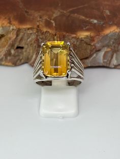 The stone in this ring us beautiful and tests as a yellow amethyst, the amethyst  has been heat treated to create the beautiful yellow you see . The emerald cut is perfection as you can gaze down into the stone. size 8 like new condition Heat Treating, Emerald Cut, Statement Ring, Rings Statement, Favorite Jewelry, Statement Rings, Emerald, Jewelry Rings, To Create