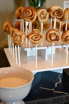 cinnamon rolls on sticks with dipping glaze so cool for a party