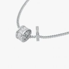 An artistic creation resulting from masterful craftsmanship, Rhodium Plated Loop Necklace has a breathtaking elegancy that is further enhanced with a brilliant similitude of center stones. Two Loops are assorted on a sparkling Rhodium Plated Chain. The bigger Loop has the words “LOVE” inscribed on side of the band while the other loop has gorgeous cubic stones placed on it, creating an elegance that will enchant the eyes of the beholder. Materials & Finishing: Rhodium plating sterling brass Meas Luxury Sterling Silver Chain Necklace With Round Pendant, Luxury Sterling Silver Round Pendant Necklace, Luxury Cubic Zirconia Clavicle Chain Jewelry, Luxury Cubic Zirconia Jewelry With Clavicle Chain, Luxury Silver Necklace With Clavicle Chain, Luxury Silver Chain Necklace With Round Pendant, Luxury Cubic Zirconia Choker Necklace, Luxury Silver Necklace With Detachable Pendant, Luxury Clavicle Chain Pendant Jewelry