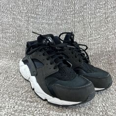 Description:  Nike Air Huarache Run Black White Women's 634835-006 Running Shoes Size 8.5 Condition:  Used – Good Condition.  No rips or tears. No box.  Item has some wear as they have been worn (see pictures).  Reach out with any questions!  Please see pictures for additional details.  The item pictured is the item you will receive.  Size: Women's US 8.5 Color:  Black, White Shipping- Item ships within one business day via standard and expedited shipping. Returns- We offer free 60 day return on Nike Huaraches For Streetwear With Branded Insole, Sporty Black Huaraches For Streetwear, Black Low-top Huaraches For Streetwear, Nike Low-top Huaraches For Running, Nike Low-top Huaraches For Streetwear, Black Low-top Sports Huaraches, Black Low-top Huaraches For Sports, Nike Low-top Huaraches With Laces, Nike Huaraches With Round Toe For Streetwear