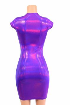 "This item is made to order, please read all the way through the listing before purchasing! This dress is made of a grape purple holographic spandex, with AMAZING shine! The deep purple reflects liquid fuchsia rainbows all over your curves, accentuating every move you make! It features a scoop neckline and cap sleeves. It is made of four way stretch lycra spandex, and it fits like a glove! Super figure flaunting and fun! LENGTH: 27\" (from the underarm to the hemline) Womens Sizing (See below fo Purple Fitted Bodycon Dress With Short Sleeves, Purple Fitted Short Sleeve Bodycon Dress, Fitted Purple Mini Dress With Short Sleeves, Shiny Sleeveless Fitted Bodycon Dress, Purple Bodycon Dress For Club, Purple Stretch Bodycon Dress For Night Out, Purple Fitted Bodycon Dress For Club, Purple Fitted Bodycon Dress, Fitted Purple Bodycon Dress For Club