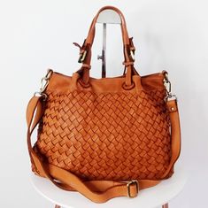 "Cognac Woven Leather Bag, Soft Woven Handbag, Leather Tote Woman, Handmade Shoulder Bag, Large Tote Bag, Modern Leather Crossbody Bag, Elow comes in two versions, LARGE: W 15\" x H 11.4\" x D 7.1\" & SMALL: W 13\" x H 10\" x D 6\". Handle drop: 4\" This bag has made by our italian partner and customizable by our team. We offer one free monogram or name personalization. Please check fonts, color thread, tag samples and leave your monogram or name to embroider. Features: Inside: The bag closes wi Leather Shoulder Bag With Handles In Cognac, Cognac Satchel With Removable Pouch For Everyday, Cognac Leather Shoulder Bag With Handles, Cognac Top Handle Bag With Handles, Rectangular Cognac Hobo Bag With Removable Pouch, Cognac Hobo Bag With Removable Pouch, Rectangular Cognac Bucket Bag With Handles, Brown Top Handle Bags With Leather Handles, Cognac Satchel Shoulder Bag For On-the-go