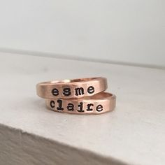 We created our Personalized Stacking Rings to mix and match perfectly with our stacking rings so you can create the stack that's just right for you. Keep your loves close, commemorate a special date or a short meaningful message, use symbols, it's totally up to you. Comes in font shown only. Available options for personalization include, heart, star, compass star or cross. This rose gold filled ring is hand forged and stamped in our studio at the time of order. It's about 4mm thick and has an or Compass Star, Gold Filled Ring, Ring Rose Gold, One Ring, Stacking Ring, Gold Filled Jewelry, Organic Shapes, 14kt Gold, Hand Forged