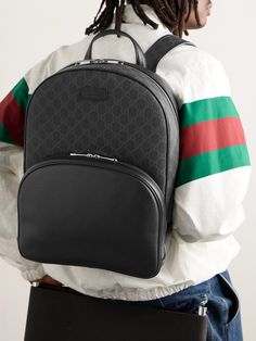 Gucci's monogram is rendered in an understated black and grey for this backpack, likely to match the majority of your suits and jackets. Made in Italy from the label's 'Supreme' coated-canvas, it's panelled with leather and has a spacious front zipped pocket to tuck your sunglasses, wallet and keys. Gucci Collection, Tom Ford Bag, Leather Backpack For Men, Gucci Monogram, Black Leather Backpack, Luxury Sneakers, Suits And Jackets, Gucci Leather, Stylish Watches