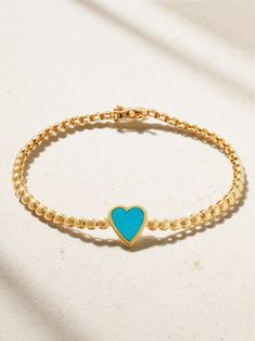 Your new lucky charm, Jennifer Meyer's bracelet is inlaid with protective turquoise in a heart-shaped setting. Handmade in Los Angeles, the 18-karat gold beaded chain slinks effortlessly across your wrist. Elegant Turquoise Heart Beads Jewelry, Turquoise Heart Beads Bracelet, Elegant Turquoise Jewelry With Heart Beads, Elegant Blue Bracelets With Heart Charm, Elegant Blue Bracelet With Heart Charm, Turquoise Bracelets With Heart Charm As Gift, Turquoise Bracelet With Heart Charm As Gift, Turquoise Bracelet With Heart Charm For Gifts, Turquoise Heart Bracelet As A Gift