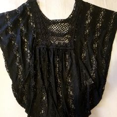 Black Lace Boho Style Top From The Buckle Dolman Sleeve Size Small Ladder Back Detail Scoop Neck With Square Crochet Detail Across Chest Worn Once Black V-neck Lace Top, Black Lace V-neck Top, Black V-neck Crochet Top For Spring, Black Lace Trim Top For Spring, Fitted Black Crochet V-neck Top, Fitted Black V-neck Crochet Top, Casual Black Lace Blouse, Black Lace Top With Short Sleeves For Summer, Black V-neck Lace Top For Summer