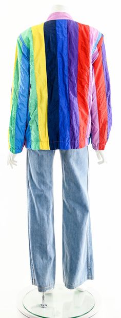 "-Vintage 80's Exceptional Patchwork Quilted Rainbow Jacket by MARGUERITE RUBEL San Francisco -Hand Stitched Multicolored Stripes of Primary Rainbow and Pastel Rainbow Nylon -Bomber Jacket Style and Fit -Mandarin Collar -Button Up Front with Matching Lavender Buttons -Lined in Matching Purple Nylon -Hidden Inseam Pockets Along Side Waist -Long Sleeves -Pink Contrast Stitching -Great Unisex Fit and Look -Rare and Hard-to-Find Statement Coat Perfect for Brightening Up Your Day and Others! Brand/De Vintage Multicolor Windbreaker With Pockets, Retro Multicolor Windbreaker For Fall, 90s Style Multicolor Spring Outerwear, 90s Multicolor Spring Outerwear, Vintage Multicolor Windbreaker For Spring, Vintage Multicolor Patchwork Outerwear, Vintage Multicolor Outerwear With Pockets, Retro Multicolor Spring Windbreaker, Vintage Multicolor Windbreaker For Fall