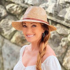 A romantic western hat inspired by Jane Seymour's role in Dr. Quinn, Medicine Woman, and a new addition to Wallaroo Hat Company's Jane Seymour collection. Versatile shapeable brim allows the brim to be adjusted up or down, 3" wide. Teardrop crown with slight front pinch. Multi-strand leather cords tied to a metal loop with loose ends. Tightly braided raffia construction blocks 97.5% of UV rays. UPF 50+ rated sun hat. Print cotton lined crown for additional sun protection. WALLAROO emblem. Inner One Size Fits Most Sun Hat With Curved Brim, Wide Brim Sun Hat For Ranch, Western Brown Sun Hat For Travel, Natural Brimmed Hat For Ranch, Western Style Fedora Straw Hat For Travel, Western Style Brown Sun Hat For Travel, Wide Brim Sun Hat For Western-themed Events, Country Style Brimmed Fedora (one Size Fits Most), Country Style Fedora Straw Hat For Travel