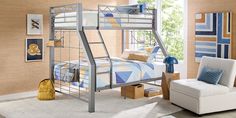 a bedroom with a bunk bed and chair in it