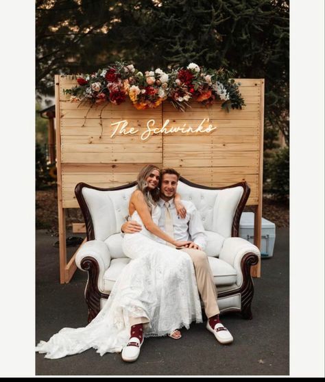 Loveseat Wedding Photos, Wood Panel Wedding Backdrop, Wedding Backdrop Reception For Pictures, Photo Op Wedding Backdrop, Modern Wedding Photo Backdrop, Wedding Name Signs Backdrop, Vintage Couch Wedding Photos, Photo Backdrop Neon Sign, Wedding Wood Backdrop