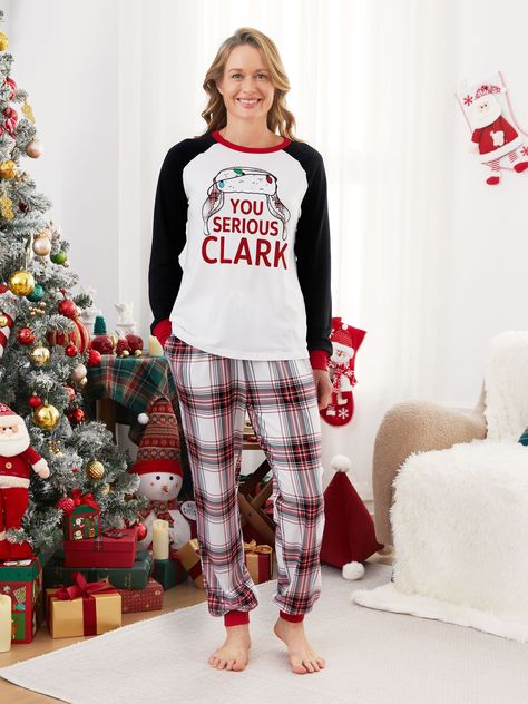 Get into the holiday spirit with our matching Christmas family pajamas. Featuring the iconic YOU SERIOUS CLARK? line from the movie and a festive trapper hat design on the shirt, these PJs are sure to bring some fun and warmth to your family. * Please add each size separately to your shopping cart. * Each size includes 1 set of pajamas (1 top+1 bottom), or 1 romper, or 1 pet bandana. *  For children's safety, pajamas should be snug-fitting or flame-resistant. These kids' and babies' pajamas are flame-resistant. * Fabric characteristics: Soft and comfortable, featuring plaid pattern on the pants and a red cuff design * Neckline: Crew neck * Sleeves: Long sleeves * Style: Christmas style * Fit: Regular fit * Length: Regular length * Source of goods: Imported * Supplier: PatPat Family Matching Pajamas, Christmas Pjs Family, You Serious Clark, Family Pajama Sets, Believe In The Magic, Raglan Sleeve Top, Boo Basket, Cuff Design, Trapper Hat