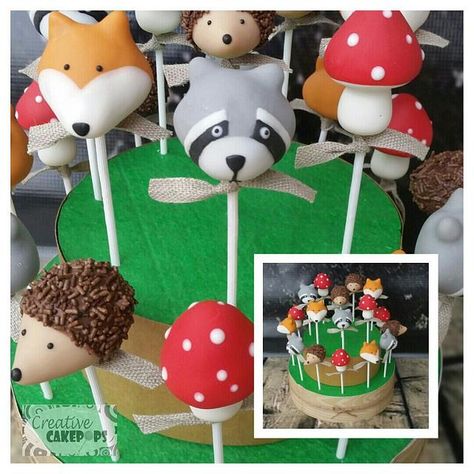 Woodland themed cake pops, raccoons, foxes, toadstools and hedgehogs. Also woodland themed iced cookies, foxes, toadstools, squirrels, hedgehogs and acorns. Woodland Cake Pops, Woodland Animal Cake, Rustic Baby Shower Cake, Animal Cake Pops, Chocolate And Vanilla Cake, Woodland Animals Theme, Woodland Cake, Pop Ideas, Birthday Cake Pops