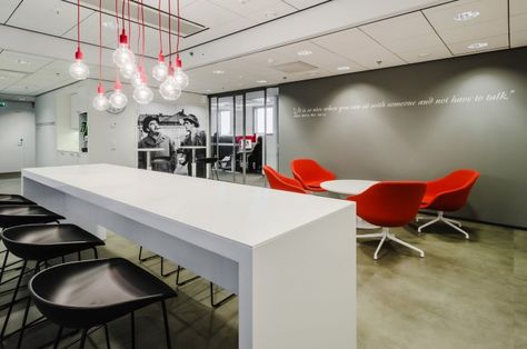 Nice red accent detail ( light bulb wires) Finnkinos Movie Theater styled Offices Warehouse Ideas, Breakout Area, Office Design Inspiration, Modern Office Decor, Staff Room, Office Space Design, Office Designs, Exhibit Design, White Office