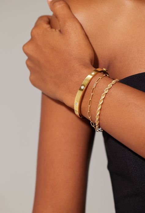 Love It More, With Layers Set of 3 Bracelets, Seen in Photo Forever Bracelet- Gold (6.5" Circumference) Jet Set Bracelet (6" With 1.25" Extender) Harper Bracelet (6" With 1.25" Extender) Sets are sold at a 10% discount, already included in price Layering Bracelets Gold, How To Wear Multiple Bracelets, Everyday Bracelet Stack, Gold Bracelet Stack, Jewellery Styling, Solid Gold Bangle, Jewelry Stack, Forever Bracelet, Gold Bracelets Stacked