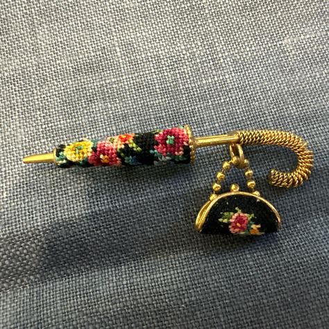 This Unique Vintage Pin Is A Beautiful Representation Of A 1960s Era Umbrella With Purse. The Intricate Design Is Made From Gold Plate And Needlepoint, With A Yellow Gold Plated Metal Finish. The Pin Was Crafted In Austria And Is A One-Of-A-Kind Piece. The Pin Is A Perfect Addition To Any Vintage Jewelry Collection And Complements Any Outfit. The Multicolor Theme Adds A Touch Of Elegance To Any Look. This Pin Is New With Tags And Comes In Excellent Condition. Add This Beautiful Vintage Piece To Vintage Jewelry Display, Jewelry Repurposed, Vintage Pins, Intricate Design, Jewellery Display, Vintage Brooches, Vienna, Unique Vintage, Needlepoint