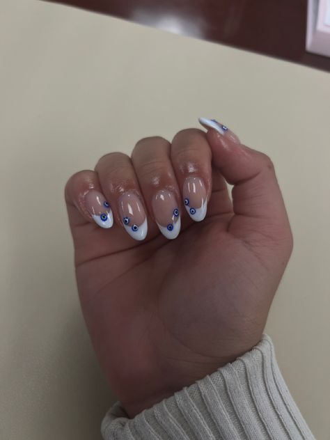 White Shalac Nails, Nail Inspo Coffin Evil Eye, French Tip With Evil Eye Nails, White French Tip Evil Eye, Heart Evil Eye Nails, Evil Eye Flower Nails, Nails Evil Eye French Tip, Greek French Tip Nails, Holiday Nails Evil Eye