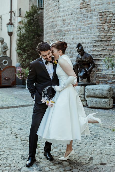 Bride Carrying Hoop Bouquet with Groom at Rome Wedding Mid Length Wedding Dress, Hoop Bouquet, Vintage Style Wedding Dress, Rue De Seine Wedding Dress, Rome Wedding, Hanging Paper Lanterns, Vintage Style Wedding Dresses, Short Formal Dress, Paper Lantern