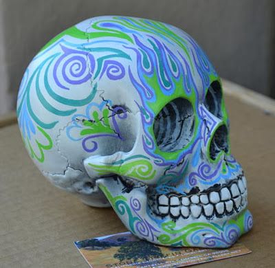 Painted Human Skulls | hand painted skull by john cloud this one is $ 89 others are available ... Decorated Skulls Human, Painted Skulls Halloween, Painted Skull Ideas, Skull Design Ideas, Ceramic Skull Painting Ideas, Skull Painting Ideas, Painting Skulls, Skull Furniture, Sugar Skull Painting