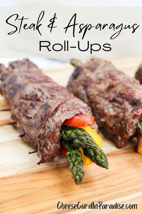 Skirt steak rolled around asparagus and peppers. Steak Asparagus Roll Ups, Asparagus Wrapped In Steak, Flank Steak Wrapped Asparagus, Beef Wrapped Asparagus, Steak Wrapped Veggies, Rolled Steak Recipes, Steak Wrapped Asparagus, Balsamic Steak Rolls, Steak And Asparagus