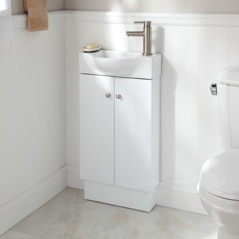 Small Bathroom Vanities and Sinks for Tiny Spaces | Apartment Therapy Small Sink Vanity, Small Bathroom Sink Vanity, Small Vanity Sink, Tiny Bathroom Vanity, Tiny Bathroom Sink, Powder Room Sink, Small Bathroom Sinks, Bathroom Sink Cabinets, Narrow Bathroom