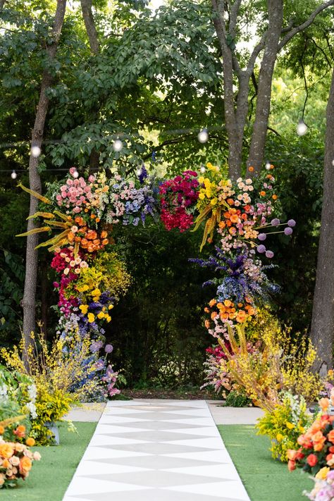 This Whimsical Texas Wedding Was an Explosion of Vibrant Florals Colorful Wildflowers Wedding, Whimsical Wedding Altar, Colorful Wedding Arch Ideas, Multicolored Flowers Wedding, Rainbow Wedding Florals, Whimsical Decor Wedding, Vibrant Wedding Florals, Bright Floral Wedding Decor, Maxamilist Wedding