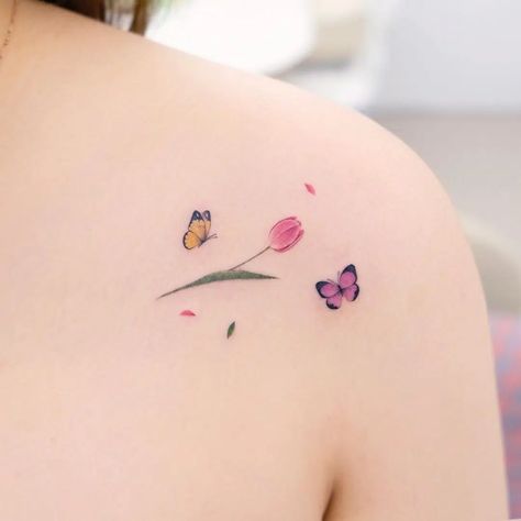 20+ Cute Small Butterfly Tattoo Designs and Ideas - HowLifeStyles Butterfly Flower Wrist Tattoo, Small Butterfly Tattoo With Color, Tulip Tattoo Finger, Tulip And Butterfly Tattoo, Small Butterfly Tattoos For Women, Tulip Tattoo Small, Butterfly And Flower Tattoo Designs, Mini Butterfly Tattoo, Small Butterfly Tattoo Designs