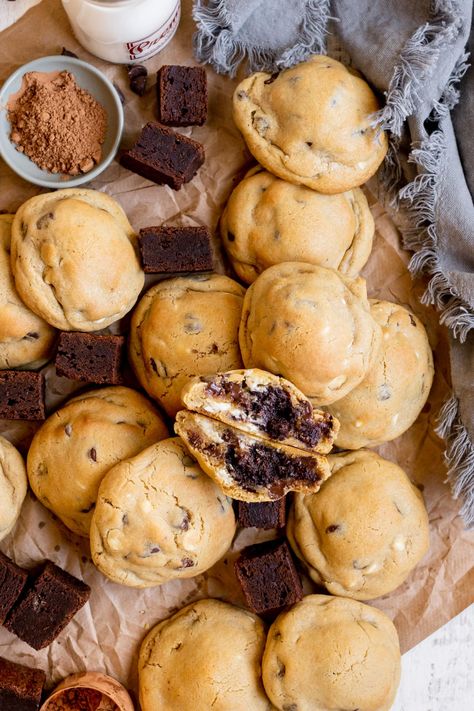 Thick, soft, brownie-filled centers, and lots of chocolatey goodness in every bite. These Brownie Stuffed Chocolate Chip Cookies are a combination of my classic Kroll's Kookies and an ooey-gooey homemade brownie tucked away in the middle. It's too good to be true! #browniecookies #brookies #browniestuffedcooked #brownies #chocolatechipcookies #giantcookies Brownie Filled Cookies, Center Filled Cookies, Brownie Cookies Aesthetic, Brownie Stuffed Chocolate Chip Cookies, Large Stuffed Cookies Recipe, Stuffed Brownie Cookies, Chocolate Chip Cookies Brownies, Brownie Stuffed Cookies, Large Stuffed Cookies