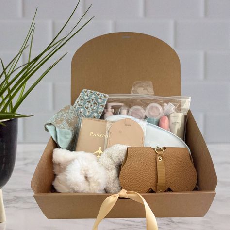 This travel gift box set is perfect for any occasion. Whether it's for a coworker, retirement, friend, or wedding, it offers practical and stylish items for their journeys, making it a thoughtful and memorable gift. https://infinitydesignline.etsy.com/listing/1682374518/travel-accessories-gift-box-destination #travel #travelgifts #travelgram #gifts #gifted #gifting #travelgifts #travelgiftsforher #retirmentgift #friendgift #giftbox #bridesmaidgifts Travel Gift Basket, Travel Kit Gift, Theme Baskets, Gifts For Travelers, Friend Vacation, Bridemaids Gifts, Travel Box, Cozy Socks, Sunglass Holder