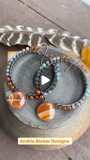 Andria Bieber on Instagram: "Make some copper wire wrapped gemstone hoop earrings with me! 🤩 frames by @nunndesign  supplies available @limabeads wire by @artisticwirebrand / @beadalon 
These earrings are made with 3mm faceted tiund gemstones in Amazonite, orange carnelian, agate, aquamarine and labradorite.
12mm orange carnelian agate stone brioletts
Copper hoops 
26 gauge soft copper wire, 2 ear wires, 4-3mm copper round spacer beads
This bead kit and the earrings are available in my store 🧡
Directions: 
1. Cut a 2 feet piece of copper wire. Starting with wire in the middle of the hoop or the opening is by the wire through one side halfway. You have equal amounts of wire for each side of the hoop.
2. Add copper spacer beads, orange agate stone, copper, spacer bead. Wire wrap around the Gemstone Hoop Earrings, Orange Agate, Bead Kits, Agate Stone, Copper Wire, Spacer Beads, Labradorite, Wire Wrapping, Copper