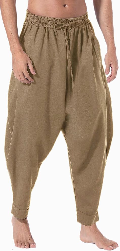 PRICES MAY VARY. Elasticated waist and ankles with two side pockets. Aladdin and hippie style adds a trendy and unique touch to your wardrobe. Wear these harem pants for men as loose fit cosplay pants, fashionable street wear, Halloween pants, dance pants, lounging pants, juggling clothes, hippie clothes & much more. Perfect for indoor and outdoor activities, or lounging around the house, these comfy mens harem pants with elastic waist effortlessly take you from day to night in superior quality Mens Harem Pants, Halloween Pants, Halloween Dance, Harem Trousers, Pants With Elastic Waist, Pants Baggy, Hippie Clothes, Hippie Pants, Dance Pants