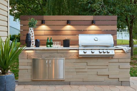 10 Outdoor Kitchen Countertop Ideas and Installation Tips Outdoor Kitchen Countertop Ideas, Outdoor Countertop, Outdoor Kitchen Lighting, Parrilla Exterior, Concrete Outdoor Kitchen, Kitchen Feature, Kitchen Countertop Ideas, Outdoor Grill Area, Backyard Getaway