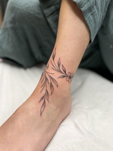 Ankle To Foot Tattoos For Women, Wrist Floral Tattoo, Ankle Floral Tattoo, Black And White Floral Tattoo, White Floral Tattoo, Ear Floral Tattoo, Vine Foot Tattoos, Wrap Around Ankle Tattoos, Anklet Tattoos For Women