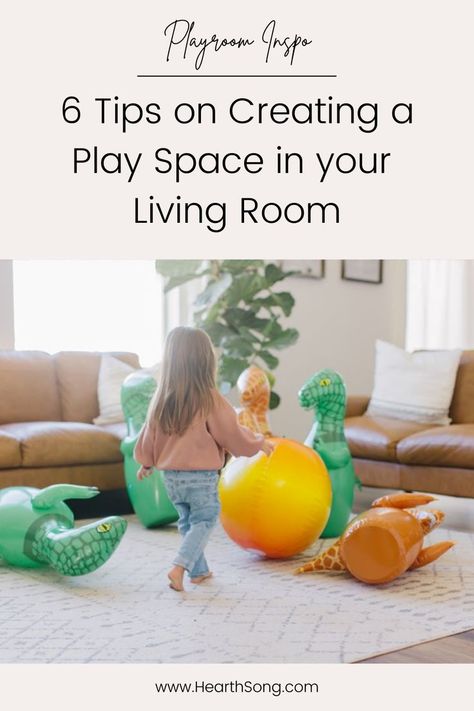 6 Tips on Creating a Play Space in your Living Room - Photo of a child playing with inflatable dinosaur bowling in a living room. Living Room Toddler Play Area, Living Room With Toddler Play Area, Baby Play Area In Living Room, Infant Play Area In Living Room, Small Play Area In Living Room, Play Corner In Living Room, Infant Play Area, Play Area In Living Room, Toddler Play Area