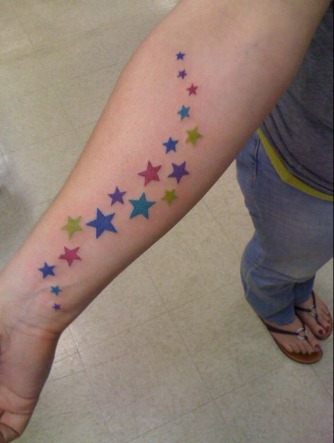 Stars Tattoo Colorful, Cute Stars Tattoo, Colourful Star Tattoo, Colour Star Tattoo, Rainbow Stars Tattoo, Star Tattoo Arm Sleeve, Star Doodle Tattoo, Star Tattoo Color, Simple Colorful Tattoos