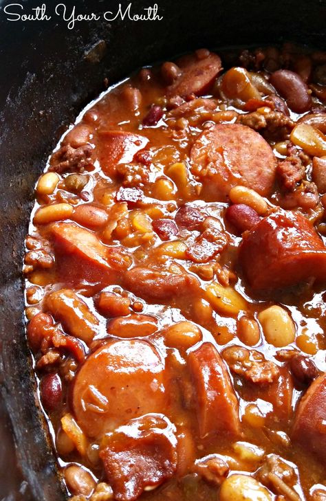 Three Meat Crock Pot Cowboy Beans | BBQ beans with smoked sausage, bacon and ground beef! Baked Beans With Bacon, Bbq Baked Beans, Bbq Beans, Smoked Sausage Recipes, Cowboy Beans, Baked Bean Recipes, Crockpot Dishes, Crockpot Recipes Slow Cooker, Bratwurst