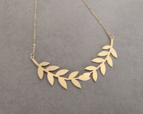 Gold Leaf Necklace, Leaf Necklace, Gold Necklace, Grecian Leaf Necklace, Leaves Jewelry, Wedding Necklace, Bridal Necklace, Laurel Necklace https://etsy.me/2wGPkAP #jewelry #necklace #gold #leaf #floral #women #brass #goldleafnecklace #leafnecklace Leaf Necklace Gold, Leaves Jewelry, Golden Pendant, Gold Leaf Necklace, Gold Collar Necklace, Bride Necklace, Necklace Bridal, Gold Long Necklace, Triangle Necklace