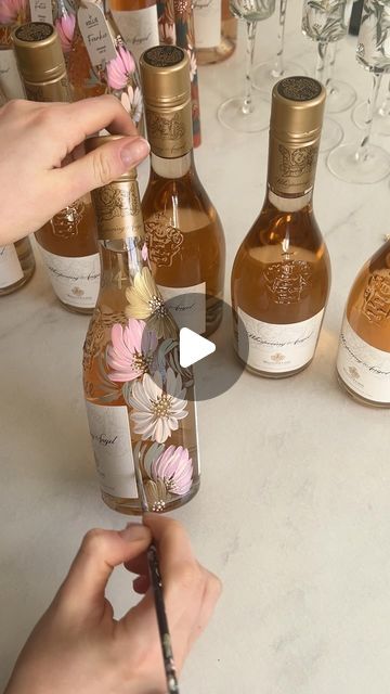 288K views · 14K likes | Hollie Yarwood on Instagram: "A little bit of pretty, country cowboy love this evening🎀  #handpaintedbottles #bridesmaids #country #countryandwestern #cowboylove #henparty #hendo #weddinggifts #giftsformygirls #bridesmaids #formybridesmaids #bridal #bride2024 #bride2025 #bridaltiktok #giftinspo #giftideas #weddingfavours #bottleart #engaged #newlyengaged #formyengaged #byhollieuk #cowboyhendo #countrywedding #specialgifts #whisperingangel #paintedwhisperingangel #proposal #bridesmaidproposal" Bridesmaid Present Ideas, Bridesmaids Gifts Ideas, Bridesmaid Proposal Box Ideas Creative, Bridesmaid Proposal Western, Diy Maid Of Honor Proposal, Bridesmaid Proposal Ideas Diy, Bridal Proposal Ideas, Bridesmaid Proposal Dinner, Western Bridesmaid Proposal