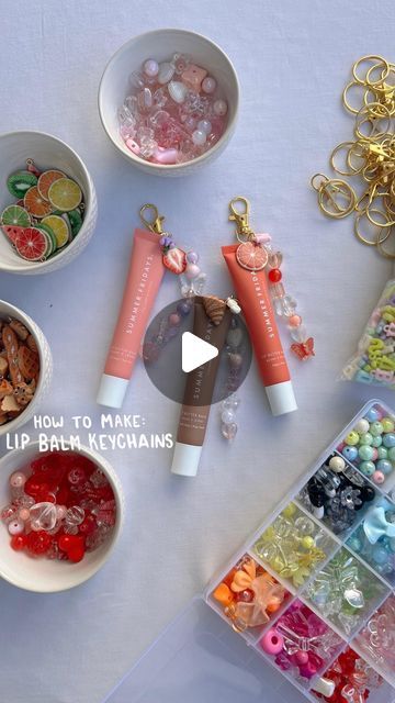 Maxie Huez | Lifestyle, Fashion & Beauty | on Instagram: "Saw @j.xnah make these and had to try with all of the lippies 🪸🌞 comment LB1 if you want the link to detailed instructions & the items I used to make lip balm keychains 🩷  #crafts #craftideas #girlsnightin #aesthetic #amazon crafty, diy, crafting, asmr, gift ideas, affordable gift ideas, cute gifts, cute crafts, diy keychain, cute keychain, cute charms, amazon crafts, amazon craft finds, amazon must haves,  crafts with friends, crafts for summer, diy crafts, lip gloss keychains, how to make lip balm keychains, summer ideas" How To Make Lip Balm Keychain, Elf Lip Gloss Keychain, Summer Fridays Lip Balm Keychain, Lip Gloss Keychain Ideas, Charm Diy Craft Ideas, Lipgloss Charms Diy, Summer Fridays Keychain, Lip Gloss Charm Diy, Diy Charm Keychain