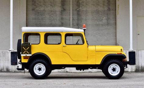 Land vehicle, Vehicle, Car, Motor vehicle, Yellow, Jeep, Jeep cj, Hardtop, Off-road vehicle, Automotive wheel system, Jeep Jamboree, Jeep Unlimited, Yellow Jeep, Jeep Cj6, Jeep Scrambler, Police Truck, Toyota Fj40, Forest Ranger, Vintage Jeep