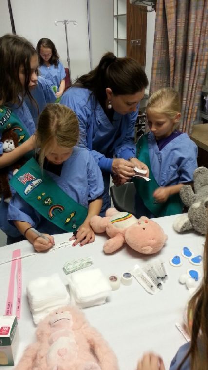 Girl Scouts earn Junior First Aid Badge at TRMC Teddy Bear Clinic Junior First Aid Badge, Teddy Bear Clinic, Junior Badges, Girl Scout Troop Leader, Brownie Badges, First Aid For Kids, Girl Scouts Brownies, Brownie Scouts, Brownie Girl