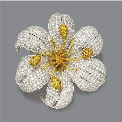 DIAMOND FLOWER BROOCH The flowerhead pavé-set with numerous round diamonds weighing approximately 14.00 carats, the center accented with gold wire stamens, four terminating in anthers pavé-set with small round diamonds of yellow hue, mounted in white and yellow gold. Formal Diamond Flower Brooch, Yellow Gold Flower Brooch Jewelry, Fine Jewelry Flower Brooch, Exquisite Diamond Flower-shaped Earrings, Diamond Flower Brooch, Luxury Formal Flower-shaped Brooches, Diamond Brooch, Diamond Flower, Yellow Diamond