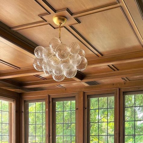 Visual Comfort & Co. on Instagram: "Hanging from a coffered ceiling, our Talia Small Chandelier by Julie Neill adds a whimsical flourish to this backyard-facing space designed by @sandedesigns. The playful fixture's swirled glass globes create contrast with the room's gorgeous wooden elements and traditional furnishings." Talia Small Chandelier, Retro Chandelier, Small Chandelier, Glass Globes, Conference Center, Coffered Ceiling, Glass Ceiling, Glass Globe, Visual Comfort