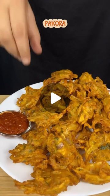 ABD on Instagram: "Aloo pyaz Pakoda 
Ingredients:
- 2 large potatoes, peeled and sliced
- 1 large onion, sliced
- 1 cup chickpea flour (besan)
- 1/2 cup all-purpose flour
- 1/2 teaspoon baking soda
- 1/2 teaspoon salt
- 1/4 teaspoon black pepper
- 1/4 teaspoon cumin seeds
- 1/4 teaspoon coriander seeds
- 1/4 teaspoon turmeric powder
- 1/4 teaspoon red chili powder
- 1/2 cup water
- Oil, for frying

Instructions:
1️⃣ Mix flours, baking soda, salt, and spices.
2️⃣ Add water and mix well.
3️⃣ Add potato and onion slices and mix.
4️⃣ Fry until crispy and golden brown!
5️⃣ Serve hot with chutney or raita!

#AlooPyazPakoraLove #AlooPyazPakoraRecipe #PakoraParty #FoodieFun #RecipeReel #FoodLover #SnackTime #Yum #Tasty #Delicious #IndianFood #Foodstagram #InstaFood #ReelFood #foodstagram#asmr  #Fo Onion Pakoda, Carom Seeds, Food Asmr, Potato Onion, Vegetarian Snacks Recipes, Quick Recipes Snacks, Gram Flour, Kitchen Recipe, Turmeric Powder