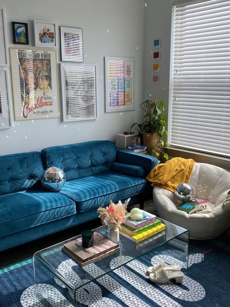 Blue Couch Home Decor, Living Room Coach Blue, Living Room Blue Velvet Couch, Blue Velvet Sectional Sofa, Gallery Wall Blue Couch, Blue Aesthetic Living Room Ideas, Blue Aesthetic Interior Design, Teal Velvet Couch Living Room, Blue Sofa Eclectic Living Room