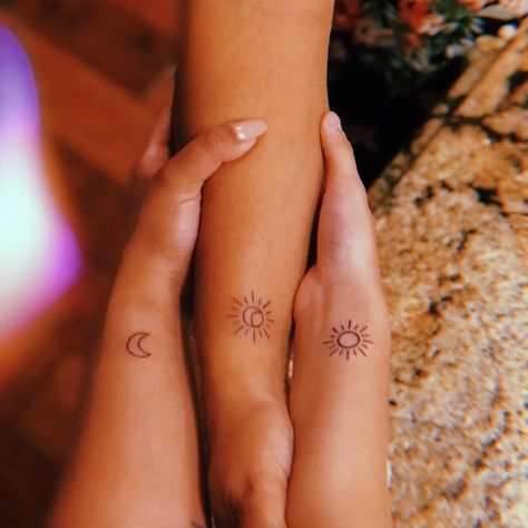 Matching sun and moon mom and daughters tattoo Matching Tattoos For Sisters And Mom, Mother Daughter Sister Tattoos Simple, Mom And Daughter Simple Tattoos, Mother With 2 Daughter Tattoos, Sun Moon Stars Mother Daughter Tattoo, Mother Daughter Sun Tattoos, Matching Tattoos With Mom And Sister, Sister Mom Tattoos, Sum And Moon Tattoo Matching