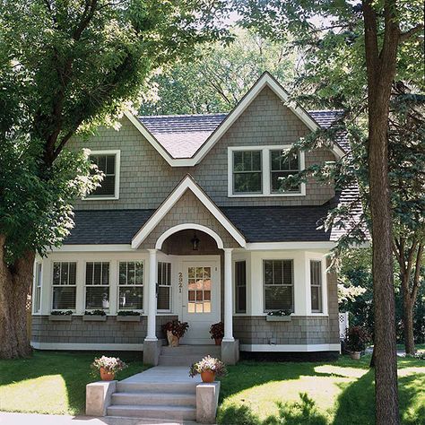 How cute is this Cape Cod home? More home exteriors: http://www.bhg.com/home-improvement/exteriors/curb-appeal/before-and-after-home-exteriors/?socsrc=bhgpin050513capecod=23 Gray House, Exterior House Color, Cottage Style Home, Cottage Style Homes, Exterior Makeover, Casa Exterior, Exterior Remodel, Design Exterior, House Paint Exterior