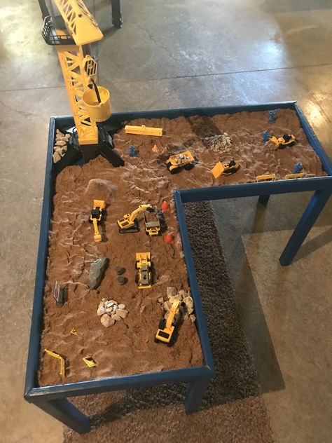 Construction play table for kids!  Kinetic sand! So amazing!! Construction Sand Box, Kids Construction Site Play Area, Outdoor Sand Table, Diy Kinetic Sand Table, Diy Sand Table For Kids, Sand Play Area For Kids, Kinetic Sand Play Area, Kinetic Sand Storage Ideas, Sand Table Ideas