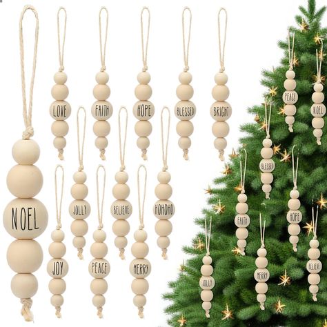 PRICES MAY VARY. Abundant and Varied Set: you will receive 24 pcs wooden Christmas ornaments, coming in 12 different styles with 2 pieces for each style; This abundant and diverse array is designed to satisfy your different decoration needs, offering you a truly elegant visual treat during Christmas season Reliable and Distinctive: the rustic home decor farmhouse is made from dependable, lightweight wood and jute, guaranteeing its durability; The natural characteristics and the inherent grain va Boho Style Christmas Decor, Wood Ornaments Christmas Tree, Western Boho Christmas Decor, Modern Farmhouse Christmas Tree Decor, Neutral Ornaments Christmas Tree, Wooden Bead Christmas Crafts, Spool Christmas Ornaments, Diy Wood Christmas Ornaments, 2024 Christmas Tree Trends